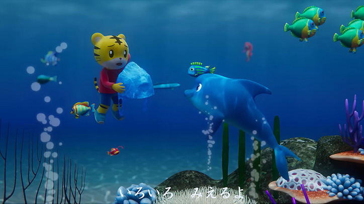 Shimajiro is facing a dolphin in the ocean.